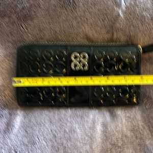 Black, leather Coach wristlet